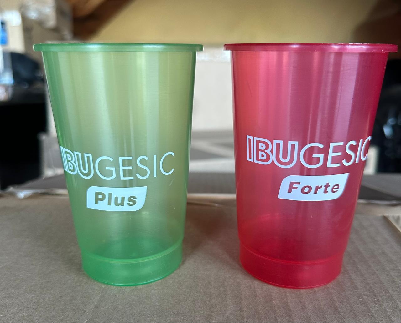 Custom branded tumblers in green and red campaign colours