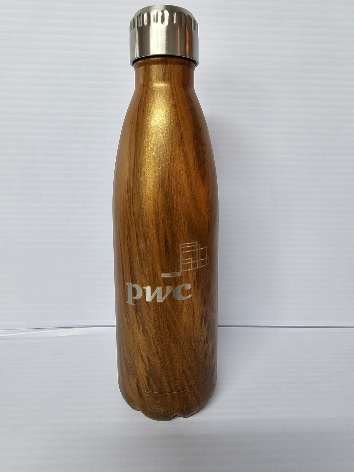 Wood-look branded PWC water bottle for corporate gifting
