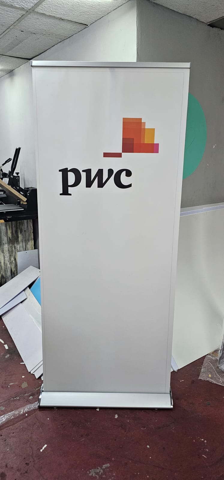 Freestanding PWC pull-up banner for indoor brand visibility