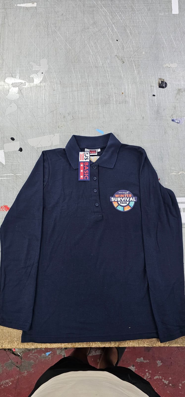 Navy branded sleeveless jacket prepared for corporate apparel
